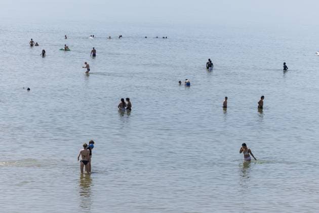 People enjoying the beach pictured at the Belgian coast in Oostende, on Saturday 23 May 2026. Tourists are expected to flock the Belgian coast, as temperatures are rising for the weekend.  NICOLASxMAETERLINCK 174833807