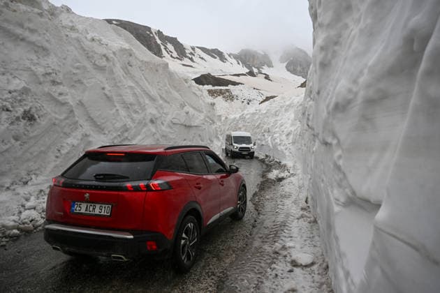 Van-Bahcesaray highway, closed for months due to avalanche risk, cleared of snow VAN, TURKIYE - MAY 23: Vehicles pass by as the teams from the Gorentas Maintenance Station of the 11th Regional Directorate of Highways carry out snow removal work on the Van-Bahcesaray highway in Van, Turkiye on May 23, 2026. Closed since December due to adverse weather conditions and avalanche risks, the highway was partially opened to single-lane traffic following a challenging 20-day effort through meters-high snow corridors. The final decision to fully open the road to traffic awaits an assessment by the Avalanche Risk Determination and Monitoring Commission. Ozkan Bilgin Anadolu Van Turkey. Editorial use only. Please get in touch for any other usage.  Copyright: x2026xAnadoluxOzkanxBilginx