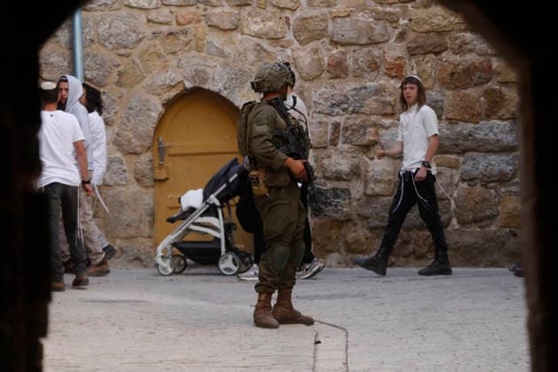 Israeli soldiers secure weekly settlers’ tour in Hebron Israeli soldiers keep watch during a weekly settlers tour in Hebron, in the Israeli-occupied West Bank, May 23, 2026. Photo by Mamoun Wazwaz apaimages Hebron West Bank Palestinian Territory 230526_Hebron_MW_00(18) Copyright: xapaimagesxMamounxWazwazx xapaimagesx
