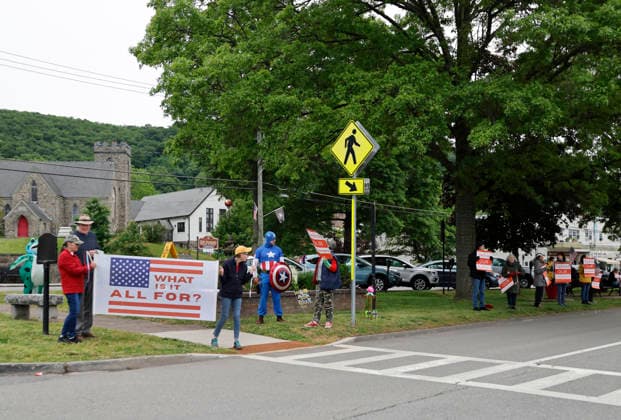 A few protesters gather outside the gates of the West Point Military Academy before the West Point Class of 2026 s commencement ceremony in Michie Stadium at the United States Military Academy in West Point, New York on Saturday, May 23, 2026. .  NYP202605239022 PeterxFoley
