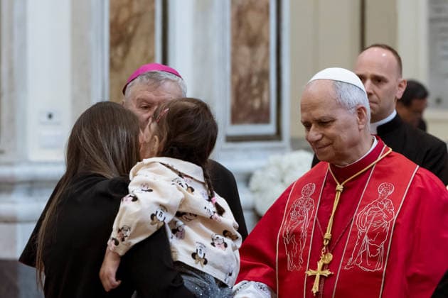 May 23, 2026, Acerra, Napoli, Italy: The Pope seen while greeting a child of a family with victims of pollution. Pope Leo XIV visited Acerra for his patroral itinerary. He was the first Pope to visit the Land of Fires, a region affected by illegal dumping and burning of toxic waste in Campania region in Italy and meet families of victims of pollution in the Cathedral of Santa Maria Assunta in Acerra. Acerra Italy - ZUMAf172 20260523_zip_f172_040 Copyright: xValeriaxFerrarox