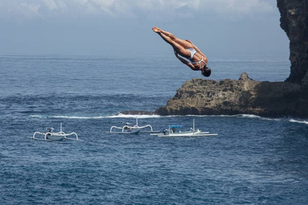 May 23, 2026, Klungkung, Bali, Indonesia: Morgane Herculano of Swiss dives from the 21-meter platform during the final round of the Red Bull Cliff Diving World Series at Broken Beach in Nusa Penida, Bali, Indonesia. Klungkung Indonesia - ZUMAp229 20260523_zip_p229_011 Copyright: xLanaxPriatnax