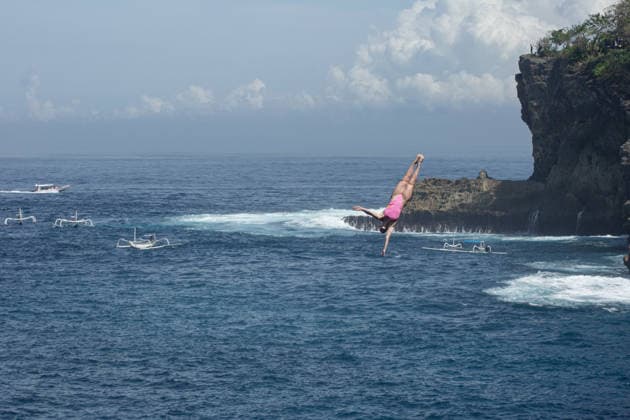 May 23, 2026, Klungkung, Bali, Indonesia: Molly Carlson of Canada dives from the 21 meter platform during the final round of the Red Bull Cliff Diving World Series at Broken Beach in Nusa Penida, Bali, Indonesia. Klungkung Indonesia - ZUMAp229 20260523_zip_p229_019 Copyright: xLanaxPriatnax