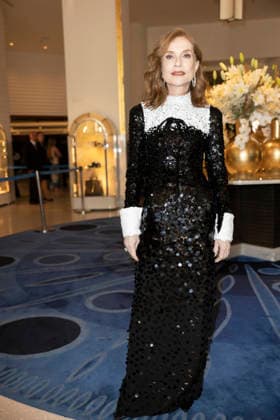 Cannes Isabelle Huppert exits Martinez MP CANNES, FRANCE - MAY 23: Isabelle Huppert leaves the Martinez Hotel to attend the closing awards ceremony during the 79th Cannes Film Festival on May 23, 2026 in Cannes, France. Photo by Marco Piovanotto Abacapress.com Cannes France  Copyright: xPiovanottoxMarco ABACAx