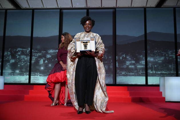 Cannes - Closing Ceremony Rwandan director and screenwriter Marie-Clementine Dusabejambo celebrates on stage after winning the Camera d Or Prize for the film Ben Imana during the closing ceremony of the 79th edition of the Cannes Film Festival in Cannes, France on May 23, 2026. Photo by Eliot Blondet ABACAPRESS.COM Cannes France  Copyright: xBlondetxEliot ABACAx