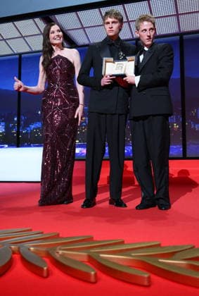 Cannes - Closing Ceremony Eye Haidara, Geena Davis, Belgian actor Emmanuel Macchia and French actor Valentin Campagne celebrate on stage after winning ex-aequo the Best Actor Prize for the film Coward on stage during the closing ceremony of the 79th edition of the Cannes Film Festival in Cannes, France on May 23, 2026. Photo by Eliot Blondet ABACAPRESS.COM Cannes France  Copyright: xBlondetxEliot ABACAx