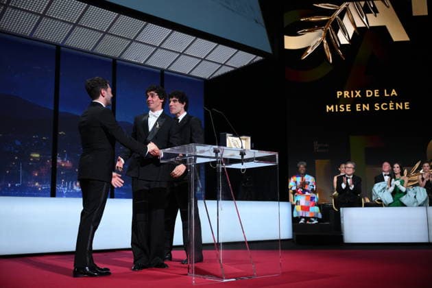 Cannes - Closing Ceremony Spanish director, screenwriter and producer Javier Ambrossi, Spanish director, screenwriter and producer Javier Calvo and Canadian filmmaker Xavier Dolan celebrate after winning the Best Director Prize for the film La Bola Negra during the closing ceremony of the 79th edition of the Cannes Film Festival in Cannes, France on May 23, 2026. Photo by Eliot Blondet ABACAPRESS.COM Cannes France  Copyright: xBlondetxEliot ABACAx
