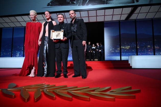 Cannes - Fjord Wins Palme D Or Award At Closing Ceremony (L-R) British actress, Tilda Swinton, Norwegian actress, Renate Reinsve, Romanian director, screenwriter and producer Cristian Mungiu and Romanian-born American actor Sebastian Stan celebrate on stage after winning the Palme d Or for the film Fjord during the closing ceremony of the 79th edition of the Cannes Film Festival in Cannes, France on May 23, 2026. Photo by Eliot Blondet ABACAPRESS.COM Cannes France  Copyright: xBlondetxEliot ABACAx