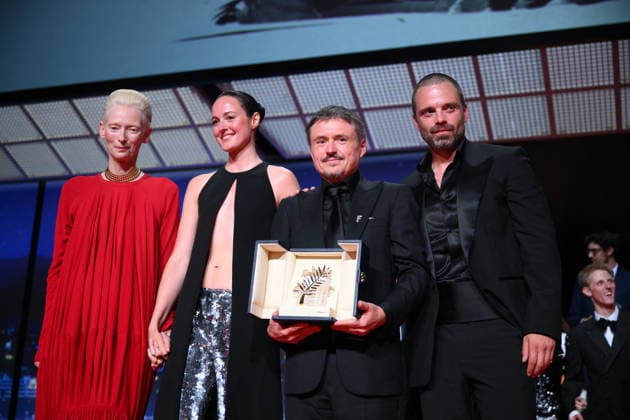 Cannes - Fjord Wins Palme D Or Award At Closing Ceremony (L-R) British actress, Tilda Swinton, Norwegian actress, Renate Reinsve, Romanian director, screenwriter and producer Cristian Mungiu and Romanian-born American actor Sebastian Stan celebrate on stage after winning the Palme d Or for the film Fjord during the closing ceremony of the 79th edition of the Cannes Film Festival in Cannes, France on May 23, 2026. Photo by Eliot Blondet ABACAPRESS.COM Cannes France  Copyright: xBlondetxEliot ABACAx