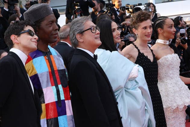 79eme Festival International du Film de Cannes Montee des marches de cloture 79th Cannes Film Festival Red carpet of the closing ceremony Diego Cespedes, Isaach de Bankole, Park Chan wook, Demi Moore, Laura Wandel and Ruth Negga 456718 2026 05 23 Cannes France  Copyright: xIsabellexVautierx xStarfacex STAR_456718_209