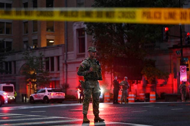 Multiple Shots Fired Half A Block From White House Complex Law enforcement, including members of the National Guard work the scene after multiple rapid-fire gunshots ring out outside the White House on May 23, 2026 in Washington, DC. A suspect was killed after opening fire on a Secret Service checkpoint outside the White House Saturday evening. Photo by Olivier Douliery ABACAPRESS.COM Washington DC United States  Copyright: xDoulieryxOlivier ABACAx