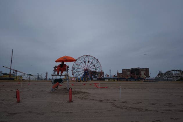 May 23, 2026, New York, New York, USA: Stormy weather, cool temperatures and rip tides resulted in deserted beaches on the first official beach day of the 2026 Summer season in Coney Island, Brooklyn. New York USA  - ZUMAl171 20260523_znp_l171_006 Copyright: xEdnaxLeshowitzx