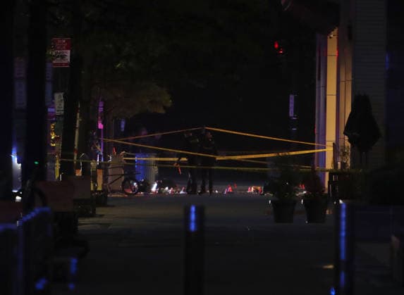 May 23, 2026, Washington, District Of Columbia, USA: Forensic investigators take photos behind a police tape blocking off a crime scene with evidence markers seen on a sidewalk on 17th and Pennsylvania Ave near the White House in Washington, DC, USA on May 23, 2026. Police and security forces swarmed the area around the White House on the evening of May 23 after reports of shots fired. Washington USA - ZUMAs337 20260523_znp_s337_005 Copyright: xGentxShkullakux