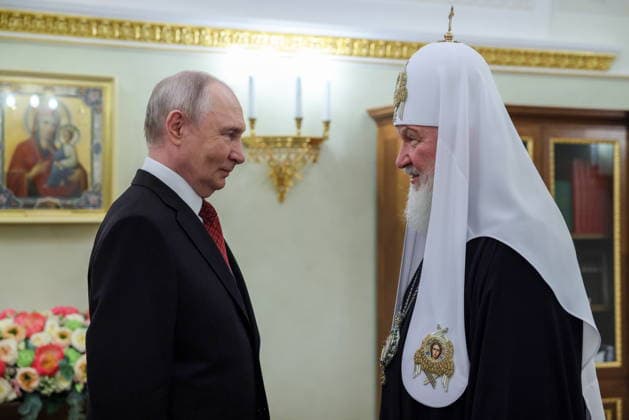 RUSSIA, MOSCOW - MAY 24, 2026: Vladimir Putin (L), President of Russia, congratulates Patriarch Kirill of Moscow and All Russia on his Name Day during a meeting at the Moscow Kremlin. Vyacheslav Prokofyev Russian Presidential Press and Information Office TASS  92974772