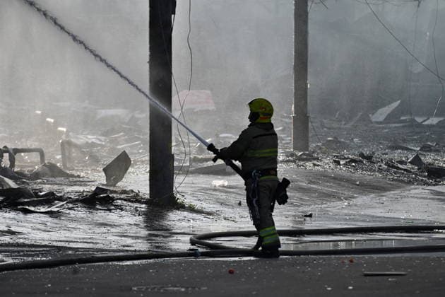 May 24, 2026, Kyiv, Ukraine: Ukrainian firefighters try to stop fire in a heavily damaged building following Russian strikes in Kyiv. A large ballistic missile attack pounded Kyiv early on May 24, authorities said, wounding at least five people after Moscow threatened retaliation for strikes in Russian-occupied eastern Ukraine. Kyiv Ukraine - ZUMAs197 20260524_aaa_s197_014 Copyright: xAleksandrxGusevx
