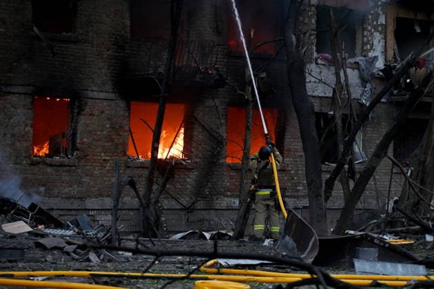 May 24, 2026, Kyiv, Ukraine: Firefighters work at the scene of a fire in a destroyed apartment building as a result of a Russian missile attack. A large ballistic missile attack pounded Kyiv early on May 24, authorities said, wounding at least five people after Moscow threatened retaliation for strikes in Russian-occupied eastern Ukraine. Kyiv Ukraine - ZUMAs197 20260524_aaa_s197_018 Copyright: xAleksandrxGusevx