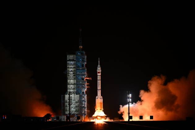 (260524) -- JIUQUAN, May 24, 2026 -- The Shenzhou-23 crewed spaceship, atop a Long March-2F carrier rocket, blasts off from the Jiuquan Satellite Launch Center in northwest China, May 24, 2026. China launched the Shenzhou-23 crewed spaceship on Sunday, which will send three astronauts to its orbiting Tiangong space station. ) FOCUS China launches Shenzhou-23 crewed spaceship LianxZhen 