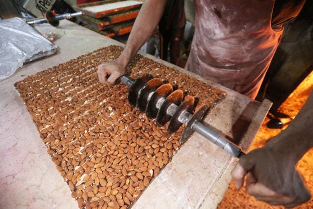 Palestinian workers produce traditional sweets ahead of Eid al-Adha Palestinian workers continued producing the traditional sweet known locally as Halakum at a factory in the Al-Daraj neighborhood, east of Gaza City, on May 24, 2026, ahead of Eid al-Adha. The factory resumed operations with limited resources after sustaining damage from Israeli airstrikes during the war. Halakum is a traditional sweet widely consumed during holidays, and the factory strives to provide it to residents despite the difficult living conditions and sharp decline in purchasing power in the Gaza Strip before Eid al-Adha. Photo by Bilal Osama apaimages Gaza city Gaza Strip Palestinian Territory 240526_Gaza_BO_01(5) Copyright: xapaimagesxBilalxOsamax xapaimagesx