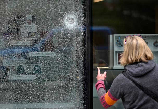 Bullet holes and shattered glass remain at The People s House near White House Complex Bullet holes and shattered glass remain at The People s House, on May 24, 2026, in Washington, DC after the U.S. Secret Service shot a person near the White House on Saturday. On Saturday, May 23, two people were struck in a shooting near the intersection of Pennsylvania Avenue and 17th Street Northwest, located just outside the White House complex. Photo by Olivier Douliery ABACAPRESS.COM Washington DC United States  Copyright: xDoulieryxOlivier ABACAx