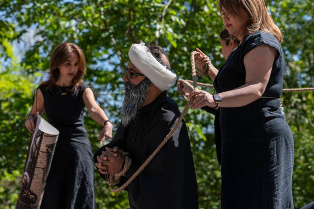 May 24, 2026, Stockholm, Sweden: Anti-Iranian regime protesters gather outside the Iranian Embassy in Stockholm, Sweden, on May 24, 2026, calling on Sweden to close the embassy and demanding restored internet access in Iran. Some demonstrators carried flags and signs in support of Reza Pahlavi. During the protest, participants staged a symbolic performance depicting imprisoned women confronting captured clerics, while chanting slogans against the Iranian regime and the ruling mullahs. Sweden  - ZUMAa136 20260524_zap_a136_021 Copyright: xJoelxLindhex