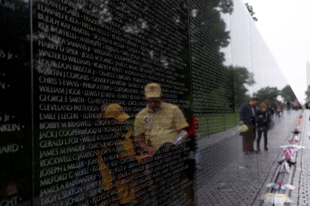 May 24, 2026, Washington, District Of Columbia, USA: Visitors are reflected at the Vietnam Veterans Memorial following the Rolling to Remember ride over Memorial Day weekend in Washington, DC, USA, on May 24, 2026. The Rolling to Remember tradition has been active for 38 years, honouring fallen service members, prisoners of war, and those still missing in action during Memorial Day weekend. Washington USA - ZUMAs337 20260524_znp_s337_049 Copyright: xGentxShkullakux