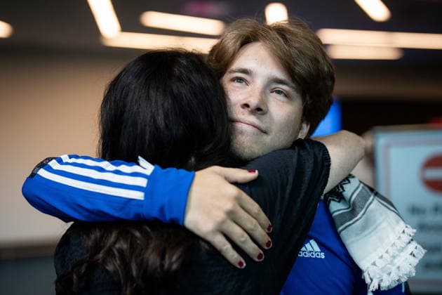 May 24, 2026, Vancouver, Bc, CANADA: Sebastian Tow, right, member of the Gaza flotilla, reunites with his mother Anita Wittenberg as he arrives at the Vancouver International Airport in Richmond B.C., on Sunday, May 24, 2026. Vancouver CANADA  - ZUMAc35_ 20260524_zaf_c35_150 Copyright: xEthanxCairnsx