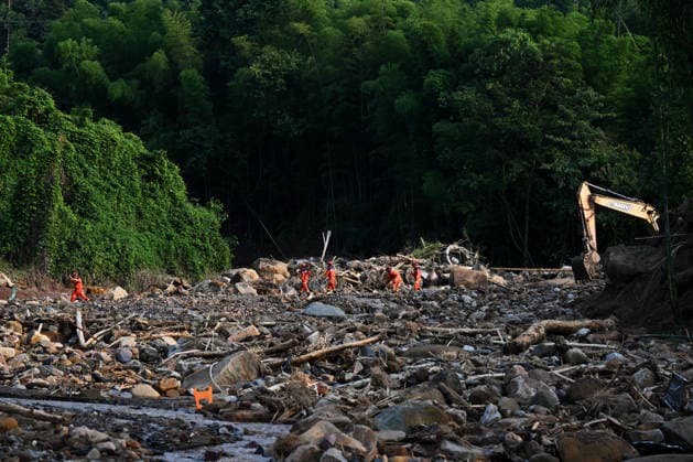 CHONGQING, CHINA - MAY 24: Rescue workers carry out search and rescue operations after extreme rainfalls trigger flash floods and geological disasters on May 24, 2026 in Yongchuan District, Chongqing City, China. Devastating rainstorms struck parts of Southwest China s Chongqing over the weekend, resulting in multiple casualties and missing people in the municipality s Yongchuan and Beibei districts. Rescue efforts are ongoing. As of 2:30 pm on May 24, local authorities reported three deaths and 17 people missing in Yongchuan, with another two people missing in Beibei.  Copyright: xChinaxNewsxServicex 111643846465