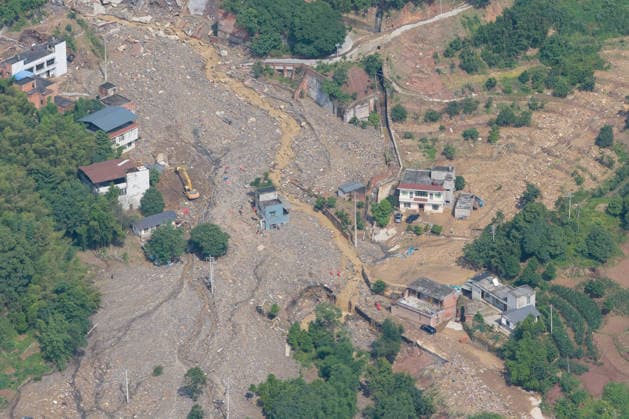 CHONGQING, CHINA - MAY 24: In an aerial view, rescue workers carry out search and rescue operations after extreme rainfalls trigger flash floods and geological disasters on May 24, 2026 in Yongchuan District, Chongqing City, China. Devastating rainstorms struck parts of Southwest China s Chongqing over the weekend, resulting in multiple casualties and missing people in the municipality s Yongchuan and Beibei districts. Rescue efforts are ongoing. As of 2:30 pm on May 24, local authorities reported three deaths and 17 people missing in Yongchuan, with another two people missing in Beibei.  Copyright: xChinaxNewsxServicex 111643846473