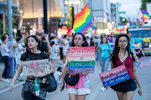 May 24, 2026, Chiang Mai, Thailand: Participants hold handmade placards during attending The Chiang Mai Pride Parade 2026 celebrations. The Chiang Mai Pride Parade 2026 took place in Chiang Mai, Thailand. Chiang Mai province holds Thailandis first Pride Month celebrations annually, promoting gender equality, diversity, and human rights as part of Pride Month activities in northern Thailand. Chiang Mai Thailand - ZUMAs197 20260524_aaa_s197_120 Copyright: xPongmanatxTasirix