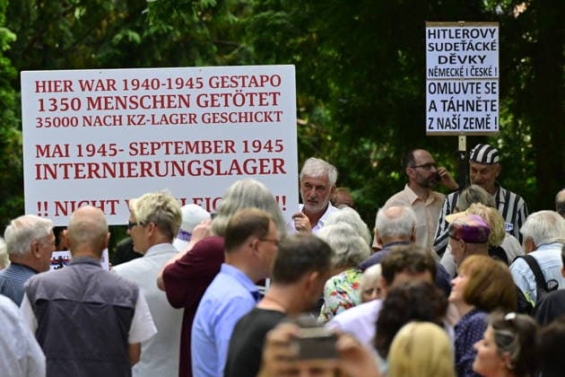 Protesters against the Sudeten German congress before the start of the commemorative act held in memory of the victims of the years 1939 to 1945 at Kounic Student Residence as part of the Meeting Brno festival and the congress of the Sudeten German Regional Association, in Brno, Czech Republic, on May 25, 2026. The congress ends here. (CTKxPhoto VaclavxSalek) CTKPhotoP2026052502239  CTKPhotoP2026052502239