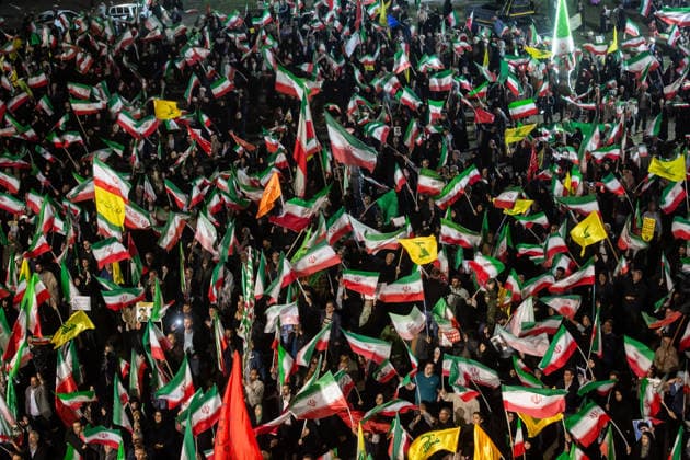 May 25, 2026, Iran, Iran: Pro-government supporters wave national flags during a state-organized rally, amid a ceasefire with Iran, the US, and Israel. President Donald Trump issued a fresh warning to Iran on May 17, saying it had to move quickly towards a peace deal or there won t be anything left of them. Washington, locked in conflict with Tehran since US and Israeli forces launched major strikes on the Islamic Republic beginning February 28, has struggled to break an impasse and make any progress toward ending a war that has shaken the Middle East and sent energy prices climbing. Iran s foreign ministry said on May 25, that Tehran was collecting fees for navigational services on ships transiting the strategic Strait of Hormuz, r - ZUMAi98_ 20260525_zih_i98_003 Copyright: xIranianxSupremexLeader SxOfficex