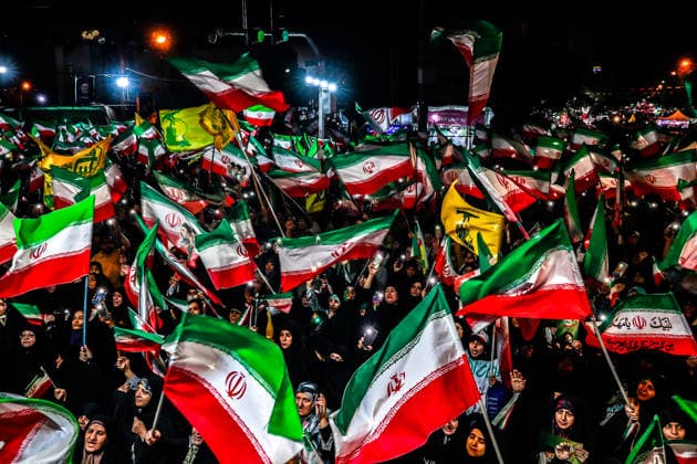 May 25, 2026, Iran, Iran: Pro-government supporters wave national flags during a state-organized rally, amid a ceasefire with Iran, the US, and Israel. President Donald Trump issued a fresh warning to Iran on May 17, saying it had to move quickly towards a peace deal or there won t be anything left of them. Washington, locked in conflict with Tehran since US and Israeli forces launched major strikes on the Islamic Republic beginning February 28, has struggled to break an impasse and make any progress toward ending a war that has shaken the Middle East and sent energy prices climbing. Iran s foreign ministry said on May 25, that Tehran was collecting fees for navigational services on ships transiting the strategic Strait of Hormuz, r - ZUMAi98_ 20260525_zih_i98_013 Copyright: xIranianxSupremexLeader SxOfficex