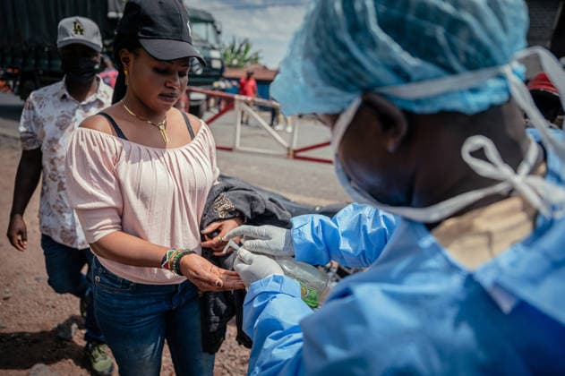 Ebola precautions continue in Democratic Republic of Congo GOMA, DEMOCRATIC REPUBLIC OF THE CONGO - MAY 25: Health workers carry out hand sanitizing, handwashing and temperature screening procedures for travelers at the Kanyaruchinya checkpoint near Goma as part of preventive measures against the Ebola virus in Goma, Democratic Republic of the Congo, on May 25, 2026. Stringer Anadolu Goma Democratic Republic of the Congo. Editorial use only. Please get in touch for any other usage.  Copyright: x2026xAnadoluxStringerx