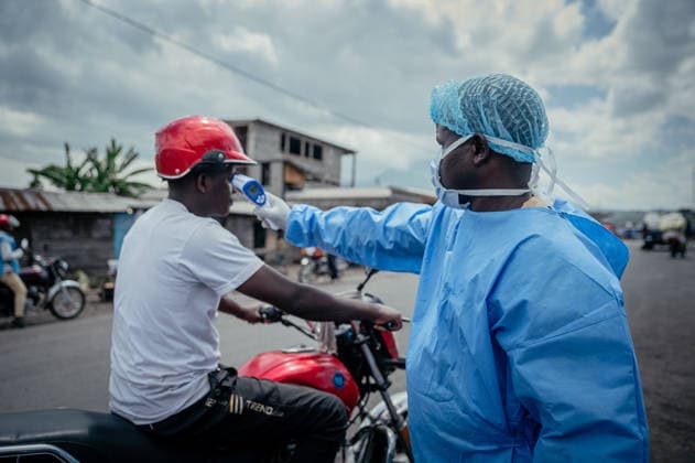 Ebola precautions continue in Democratic Republic of Congo GOMA, DEMOCRATIC REPUBLIC OF THE CONGO - MAY 25: Health workers carry out hand sanitizing, handwashing and temperature screening procedures for travelers at the Kanyaruchinya checkpoint near Goma as part of preventive measures against the Ebola virus in Goma, Democratic Republic of the Congo, on May 25, 2026. Stringer Anadolu Goma Democratic Republic of the Congo. Editorial use only. Please get in touch for any other usage.  Copyright: x2026xAnadoluxStringerx