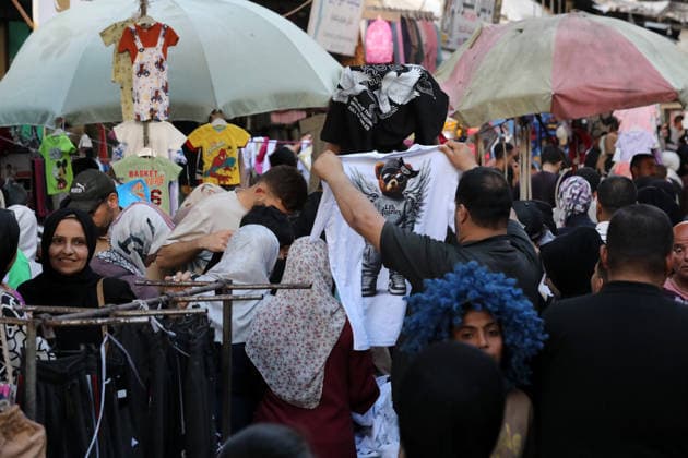 Palestinians walk through Gaza City market ahead of Eid al-Adha Palestinians walk through Omar al-Mukhtar market in Gaza City on May 25, 2026, ahead of Eid al-Adha, as vendors display goods on temporary roadside stalls. The market witnessed weak consumer demand and declining purchasing power amid worsening economic conditions caused by the ongoing war. Photo by Bilal Osama apaimages Gaza city Gaza Strip Palestinian Territory 250526_Gaza_BO_01(46) Copyright: xapaimagesxBilalxOsamax xapaimagesx