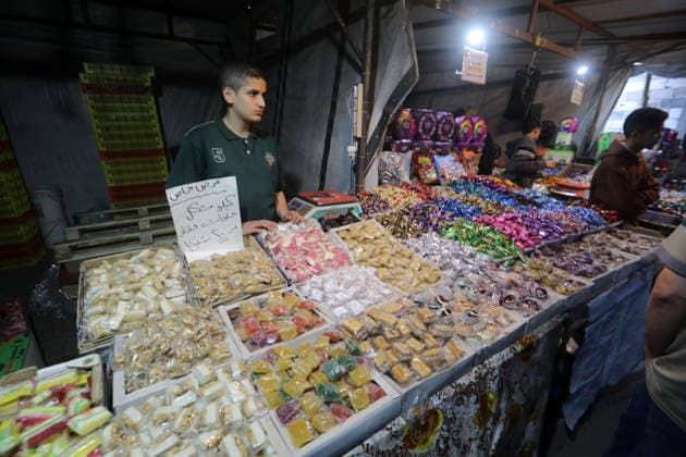 Palestinians walk through Gaza City market ahead of Eid al-Adha Palestinians walk through Omar al-Mukhtar market in Gaza City on May 25, 2026, ahead of Eid al-Adha, as vendors display goods on temporary roadside stalls. The market witnessed weak consumer demand and declining purchasing power amid worsening economic conditions caused by the ongoing war. Photo by Bilal Osama apaimages Gaza city Gaza Strip Palestinian Territory 250526_Gaza_BO_01(7) Copyright: xapaimagesxBilalxOsamax xapaimagesx