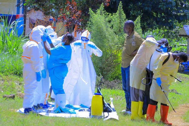 Ebola outbreak in Democratic Republic of Congo MONGBWALU, DEMOCRATIC REPUBLIC OF THE CONGO - MAY 25: Health workers wearing protective equipment carry out disinfection procedures in the area following the death of a person with suspected Ebola infection in Mongbwalu village of Ituri province in eastern Democratic Republic of the Congo, on May 25, 2026. Marcus Loika Anadolu Mongbwalu Democratic Republic of the Congo. Editorial use only. Please get in touch for any other usage.  Copyright: x2026xAnadoluxMarcusxLoikax