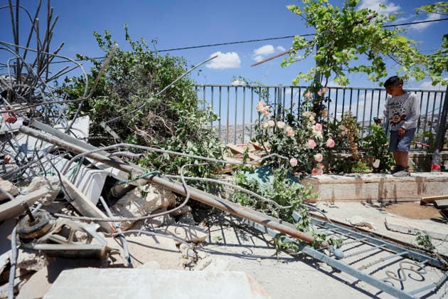 Israeli Demolition West Bank Family Displaced Eid Al-Adha A boy stands near a small garden next to the rubble of a destroyed building in Nahhalin, occupied West Bank, on May 25, 2026. The demolition, carried out by Israeli forces who stated the structure was built without a permit, displaced an eight-member Palestinian family just two days before the Islamic holiday of Eid al-Adha. Bethlehem West Bank Palestinian Territories Copyright: xMosabxShawerx