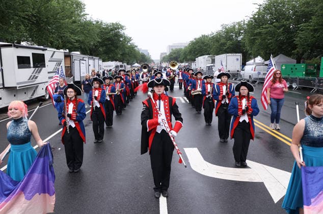 National Memorial Day Parade in Washington DC, USA. Members of the Madison High School marching band take part in the National Memorial Day Parade on Constitution Avenue in Washington, DC, USA, on May 25, 2026. The parade has been held annually since 2005, marking its 21st anniversary. Washington USA  Copyright: xMatrixxImagesx xGentxShkullakux