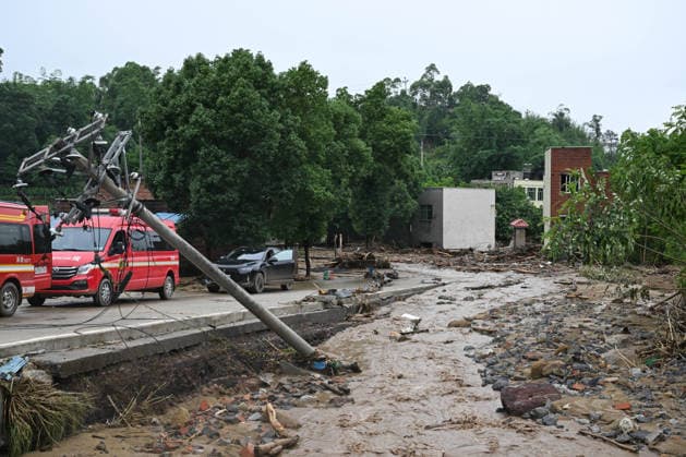 CHONGQING, CHINA - MAY 25: A broken electrical pole is seen at disaster-hit Anxi Village after a heavy rainstorm hit Yongchuan District on May 25, 2026 in Chongqing, China. Record-breaking torrential rain battered Yongchuan District in southwest China s Chongqing Municipality from late May 23 to May 24, triggering flash floods, landslides and mudslides. Rescue operations are still underway as multiple towns and subdistricts suffered severe damage.  Copyright: xChinaxNewsxServicex 111644013040