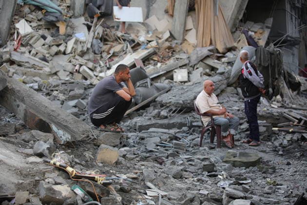 Palestinians inspect damage after Israeli strike in Nuseirat camp Palestinians inspect damage to their homes following an Israeli strike that targeted a house belonging to the al-Tawil family in the Nuseirat refugee camp in the central Gaza Strip on May 25, 2026. The strike destroyed the house completely and caused severe damage to neighboring homes. According to Palestinian medical sources, four Palestinians were wounded in the attack, which came after residents were warned to evacuate the area the previous night. Photo by Hassan al-Jedi apaimages Nusairat Gaza Strip Palestinian Territory 260526_Nuseirat_HJ_00(51).jpeg Copyright: xapaimagesxHassanxal-Jedixx xapaimagesx