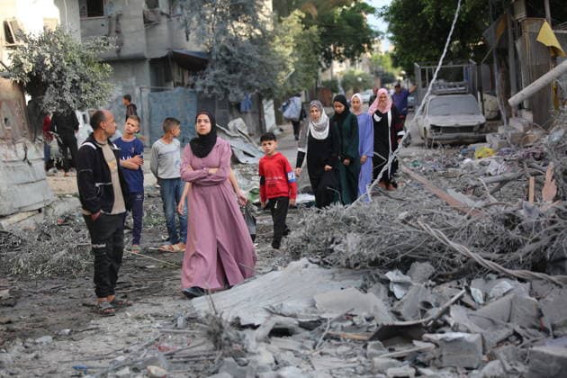 Palestinians inspect damage after Israeli strike in Nuseirat camp Palestinians inspect damage to their homes following an Israeli strike that targeted a house belonging to the al-Tawil family in the Nuseirat refugee camp in the central Gaza Strip on May 25, 2026. The strike destroyed the house completely and caused severe damage to neighboring homes. According to Palestinian medical sources, four Palestinians were wounded in the attack, which came after residents were warned to evacuate the area the previous night. Photo by Hassan al-Jedi apaimages Nusairat Gaza Strip Palestinian Territory 260526_Nuseirat_HJ_00(53).jpeg Copyright: xapaimagesxHassanxal-Jedixx xapaimagesx