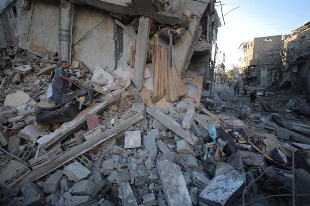 Palestinians inspect damage after Israeli strike in Nuseirat camp Palestinians inspect damage to their homes following an Israeli strike that targeted a house belonging to the al-Tawil family in the Nuseirat refugee camp in the central Gaza Strip on May 25, 2026. The strike destroyed the house completely and caused severe damage to neighboring homes. According to Palestinian medical sources, four Palestinians were wounded in the attack, which came after residents were warned to evacuate the area the previous night. Photo by Hassan al-Jedi apaimages Nusairat Gaza Strip Palestinian Territory 260526_Nuseirat_HJ_00(11).jpeg Copyright: xapaimagesxHassanxal-Jedixx xapaimagesx