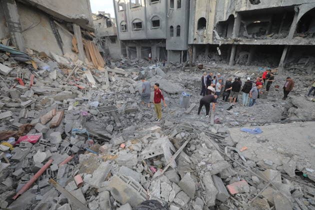 Palestinians inspect damage after Israeli strike in Nuseirat camp Palestinians inspect damage to their homes following an Israeli strike that targeted a house belonging to the al-Tawil family in the Nuseirat refugee camp in the central Gaza Strip on May 25, 2026. The strike destroyed the house completely and caused severe damage to neighboring homes. According to Palestinian medical sources, four Palestinians were wounded in the attack, which came after residents were warned to evacuate the area the previous night. Photo by Hassan al-Jedi apaimages Nusairat Gaza Strip Palestinian Territory 260526_Nuseirat_HJ_00(18).jpeg Copyright: xapaimagesxHassanxal-Jedixx xapaimagesx