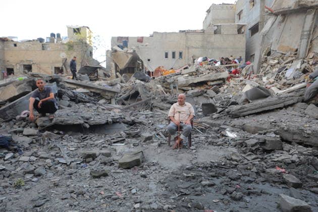Palestinians inspect damage after Israeli strike in Nuseirat camp Palestinians inspect damage to their homes following an Israeli strike that targeted a house belonging to the al-Tawil family in the Nuseirat refugee camp in the central Gaza Strip on May 25, 2026. The strike destroyed the house completely and caused severe damage to neighboring homes. According to Palestinian medical sources, four Palestinians were wounded in the attack, which came after residents were warned to evacuate the area the previous night. Photo by Hassan al-Jedi apaimages Nusairat Gaza Strip Palestinian Territory 260526_Nuseirat_HJ_00(20).jpeg Copyright: xapaimagesxHassanxal-Jedixx xapaimagesx