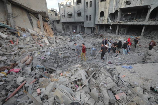 Palestinians inspect damage after Israeli strike in Nuseirat camp Palestinians inspect damage to their homes following an Israeli strike that targeted a house belonging to the al-Tawil family in the Nuseirat refugee camp in the central Gaza Strip on May 25, 2026. The strike destroyed the house completely and caused severe damage to neighboring homes. According to Palestinian medical sources, four Palestinians were wounded in the attack, which came after residents were warned to evacuate the area the previous night. Photo by Hassan al-Jedi apaimages Nusairat Gaza Strip Palestinian Territory 260526_Nuseirat_HJ_00(22).jpeg Copyright: xapaimagesxHassanxal-Jedixx xapaimagesx