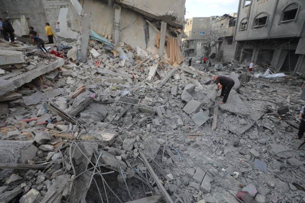 Palestinians inspect damage after Israeli strike in Nuseirat camp Palestinians inspect damage to their homes following an Israeli strike that targeted a house belonging to the al-Tawil family in the Nuseirat refugee camp in the central Gaza Strip on May 25, 2026. The strike destroyed the house completely and caused severe damage to neighboring homes. According to Palestinian medical sources, four Palestinians were wounded in the attack, which came after residents were warned to evacuate the area the previous night. Photo by Hassan al-Jedi apaimages Nusairat Gaza Strip Palestinian Territory 260526_Nuseirat_HJ_00(26).jpeg Copyright: xapaimagesxHassanxal-Jedixx xapaimagesx