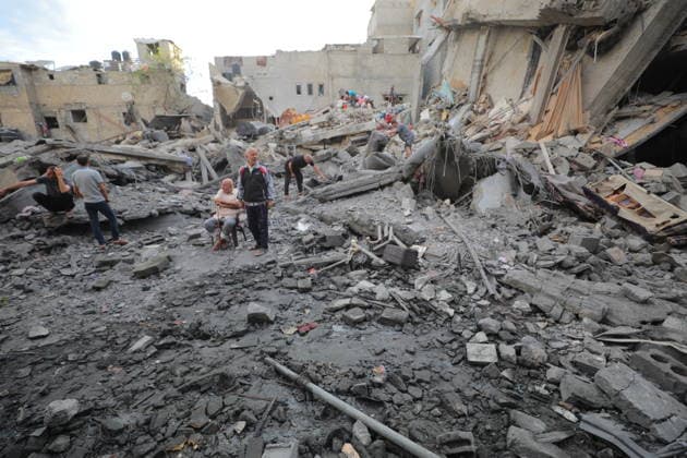 Palestinians inspect damage after Israeli strike in Nuseirat camp Palestinians inspect damage to their homes following an Israeli strike that targeted a house belonging to the al-Tawil family in the Nuseirat refugee camp in the central Gaza Strip on May 25, 2026. The strike destroyed the house completely and caused severe damage to neighboring homes. According to Palestinian medical sources, four Palestinians were wounded in the attack, which came after residents were warned to evacuate the area the previous night. Photo by Hassan al-Jedi apaimages Nusairat Gaza Strip Palestinian Territory 260526_Nuseirat_HJ_00(29).jpeg Copyright: xapaimagesxHassanxal-Jedixx xapaimagesx