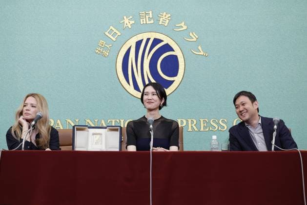 Cannes winners at press conference in Tokyo Actresses Tao Okamoto (C) and Virginie Efira attend a press conference with Japanese film director Ryusuke Hamaguchi at the Japan National Press Club in Tokyo on May 26, 2026, after the two won the best actress award at the Cannes Film Festival on May 23 for All of a Sudden directed by Hamaguchi.  A14AA0005614881P