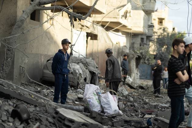 Israeli army bombed a building in Nuseirat NUSEIRAT, GAZA, PALESTINE - MAY 26: Local residents inspect the destroyed building and the damaged houses following the Israeli strike on a building belonging to the Tawil family in the Nuseirat Refugee Camp in Gaza, Palestine on May 26, 2026. The building was completely destroyed in the attack, while nearby homes were also damaged. Residents went through the rubble to find their belongings. Mahmoud Abu Hamda Anadolu Nuseirat Gaza. Editorial use only. Please get in touch for any other usage.  Copyright: x2026xAnadoluxMahmoudxAbuxHamdax